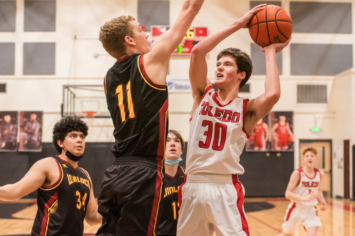 Toledo’s Kaven Winters (30) goes up with the ball during a game against Winlock Saturday night.