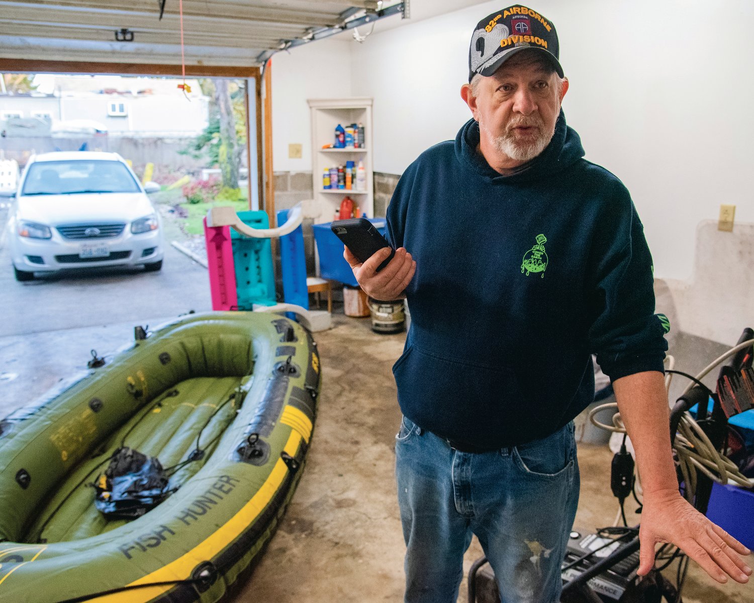 James Miller talks about his decision to blow up an inflatable raft as water from China Creek rose into the 500 block of Hemlock Street in Centralia.