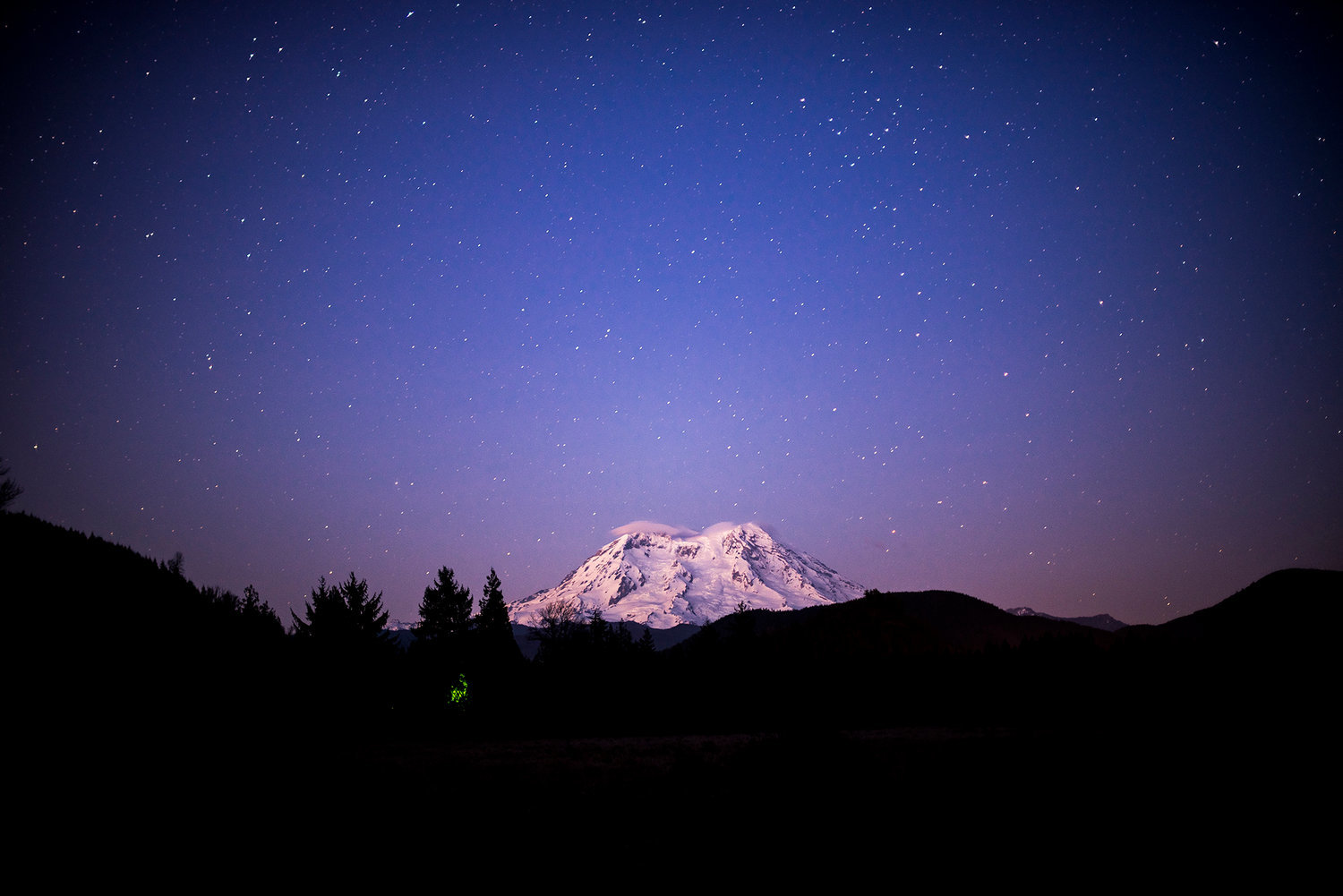 FILE PHOTO — The stars sparkle in the twilight as Mount Rainier sits in the background in this photo take south of Elbe along State route 7.