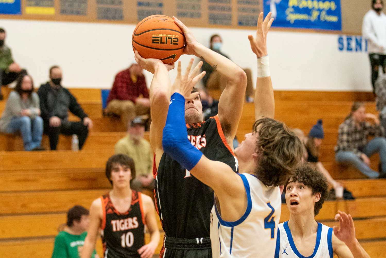 Centralia's Rex Akins (14) shoots a contested jumper against Rochester on Jan. 19.