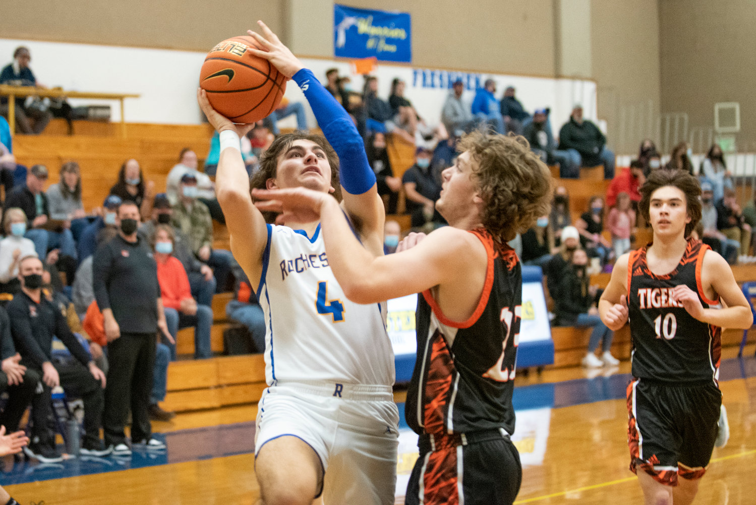 Rochester's Saywer Robbins (4) drives for a shot in the paint against Centralia's Cole Wasson (23) at home on Jan. 19.