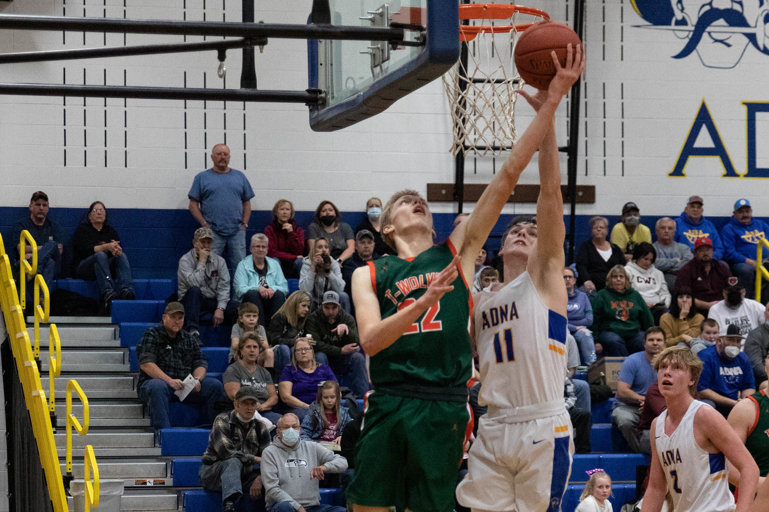 MWP forward Gary Dotson rises for a reverse layup against Adna's Chase Collins Jan. 28.