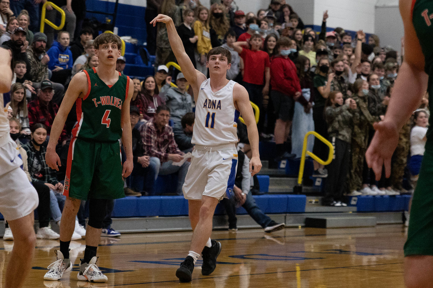 Adna guard Chase Collins watches his 3-point shot attempt against Morton-White Pass Jan. 28.
