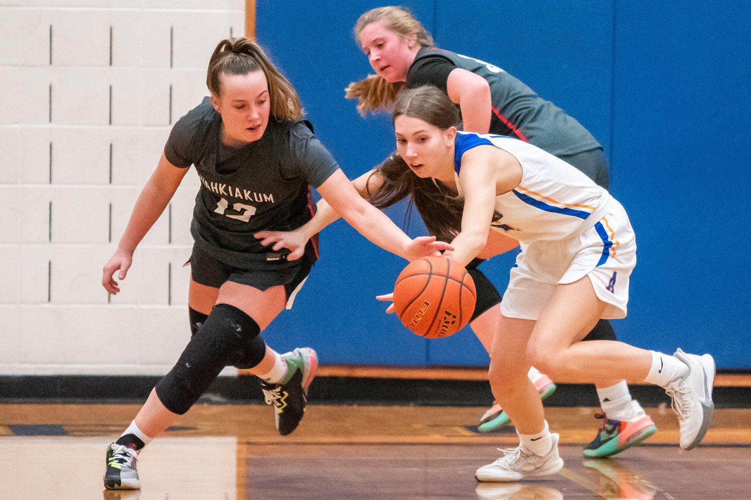 Adna Senior Faith Wellander (11) looks to steal Monday night during a game.