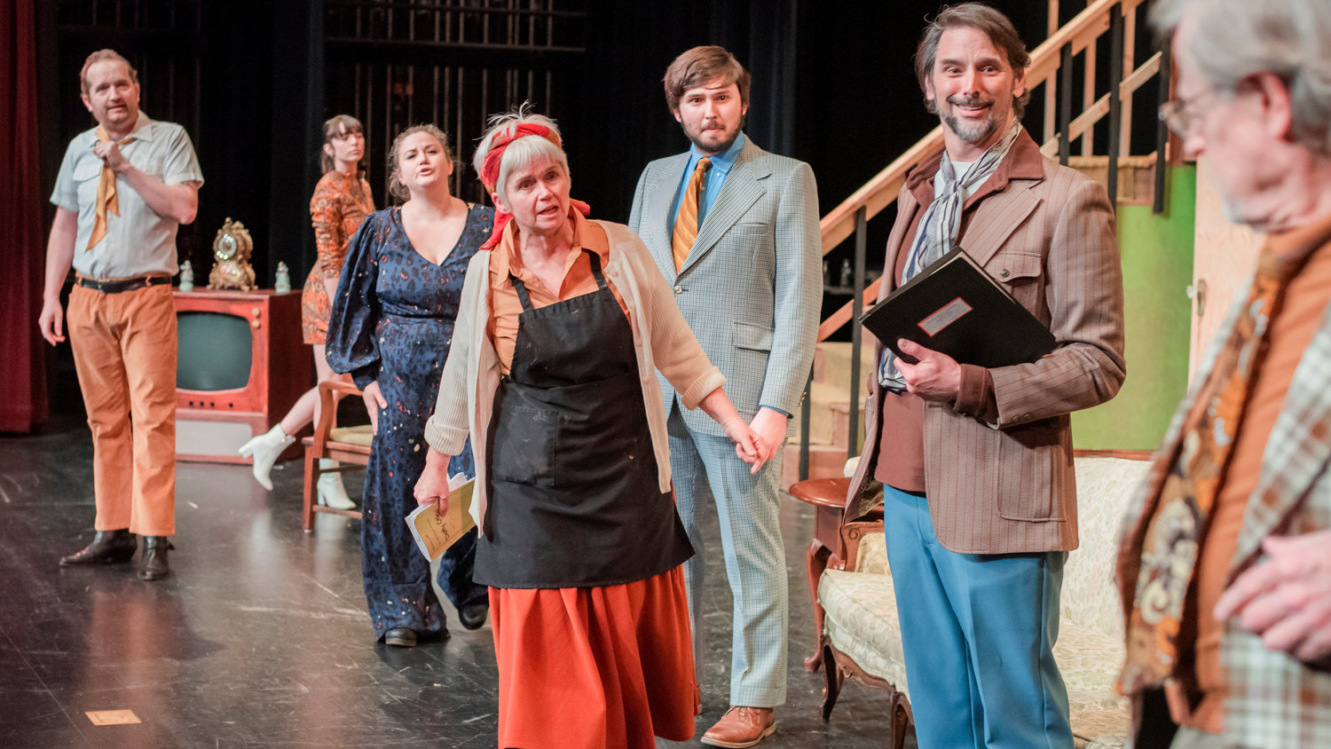From left, Isaac Wulf as Freddie Fellowes, Isabel Nixon Klein as Brooke Ashton, Jennifer Cole as Belinda Blair, Yvonne Christina as Dotty Otley, Judah MacNeely as Gary Lejune, Seth MacNeely as Lloyd Dallas, and D Douglas Lukascik perform on stage during dress rehearsals for the “Noises Off,” play by Michael Frayn at Centralia College directed by Emmy Kreilkamp.