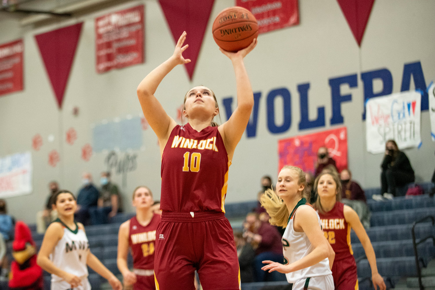 Winlock senior Madison Vigre (10) gets a wide-open shot against Morton-White Pass in the district playoffs on Feb. 8.