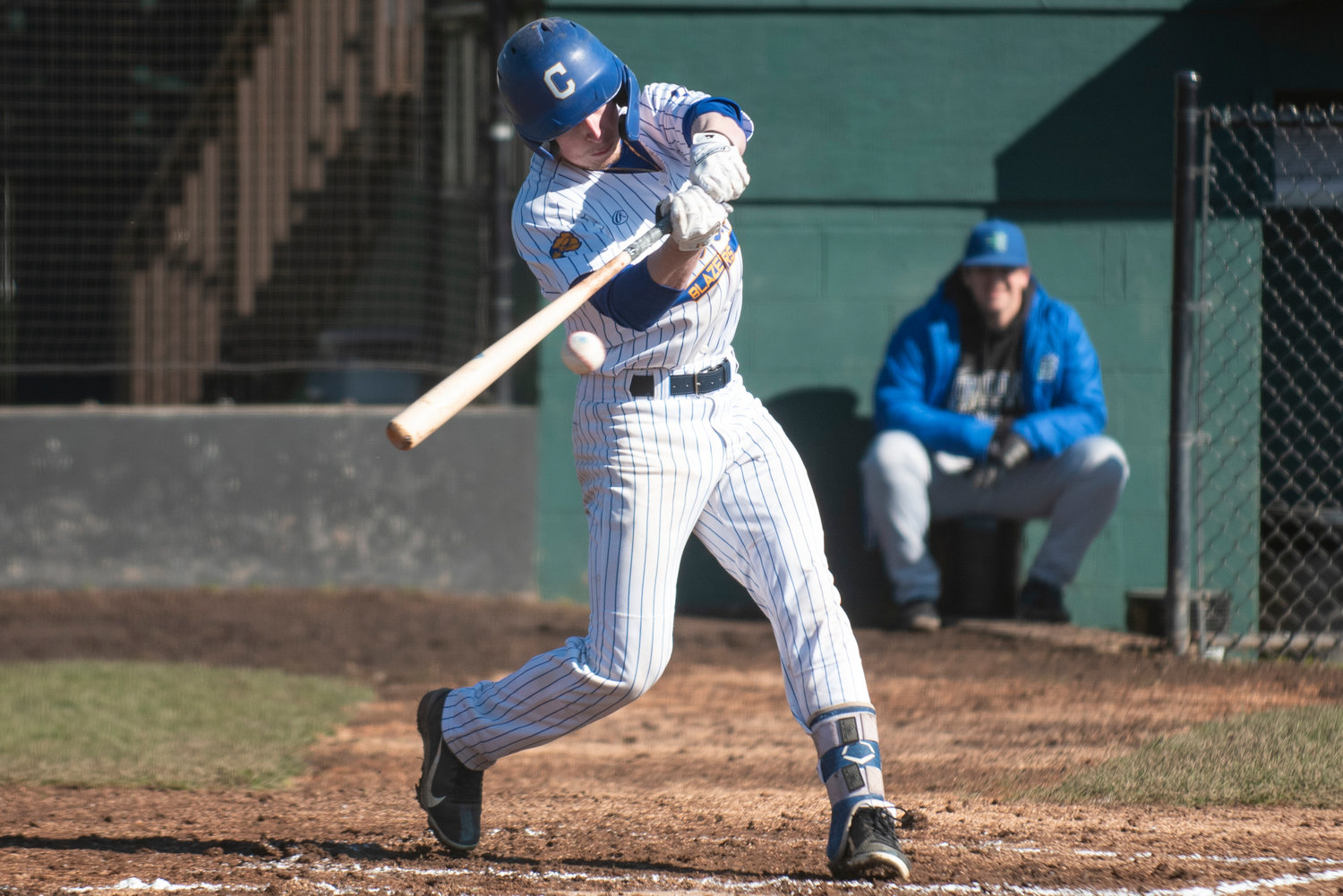 Centralia College's Jaymz Knowlton lines up an Edmonds's pitch during a home game on Feb. 25 at Wheeler Field.
