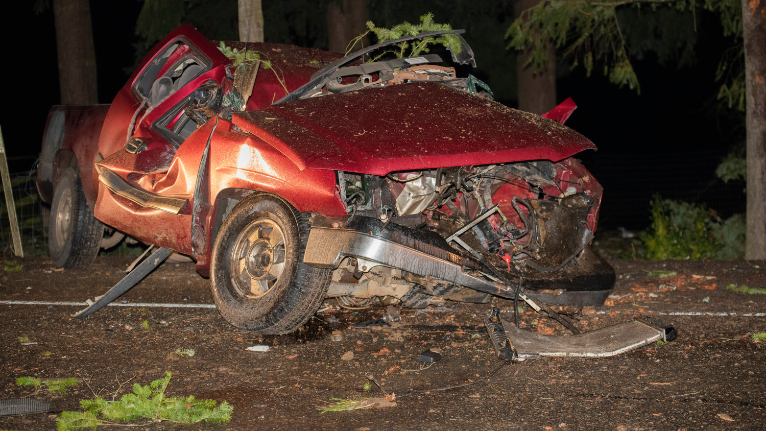 Branches are seen on a vehicle following a crash along Jackson Highway in Chehalis Wednesday night.