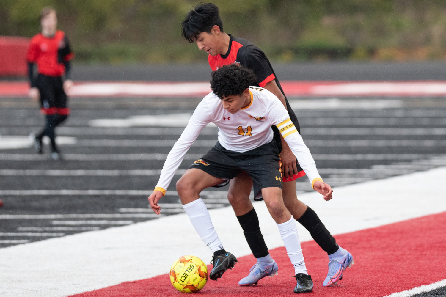 A United player looks to keep possession against Tenino March 15 at Tenino Beaver Stadium.