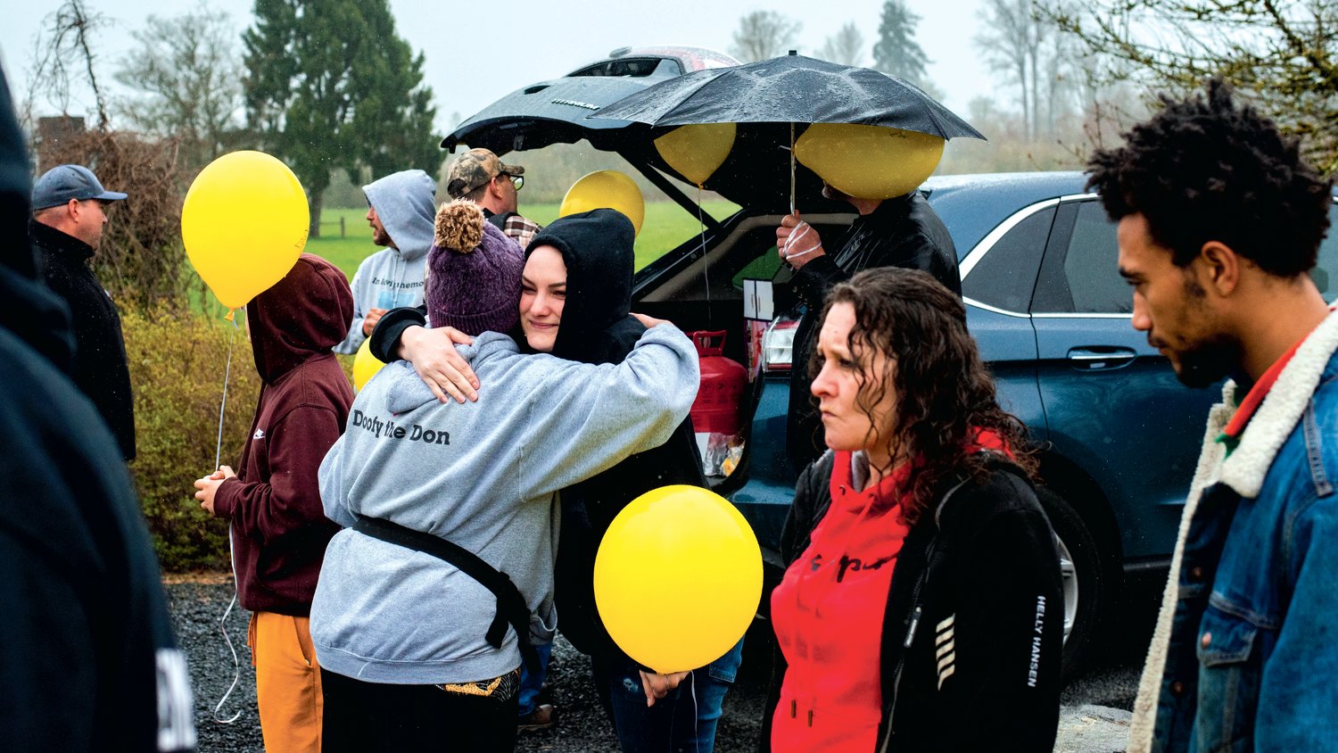 Friends and family mingle during an event marking one year since Zachary Rager lost his life.