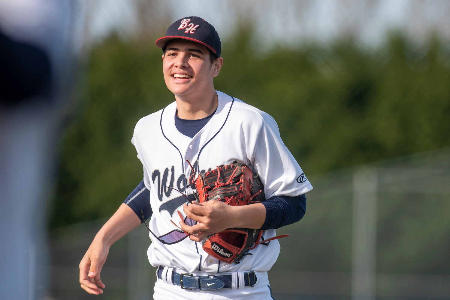 Black Hills' Mark Otto smiles after making the final out of the first inning during a home game against Tumwater on March 24.
