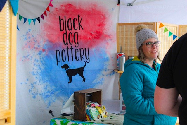 Black Dog Pottery owner Jessica Kinney is pictured with some of her merchandise at Gemini Events vendor fair in these photographs she provided to The Chronicle.