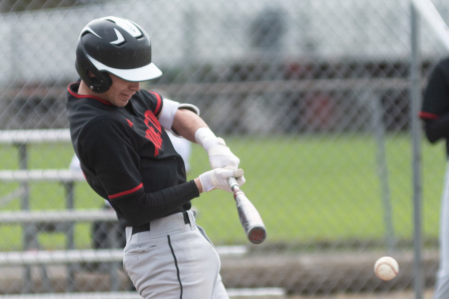 Toledo's Carson Gould takes a swing against Wahkiakum March 28.