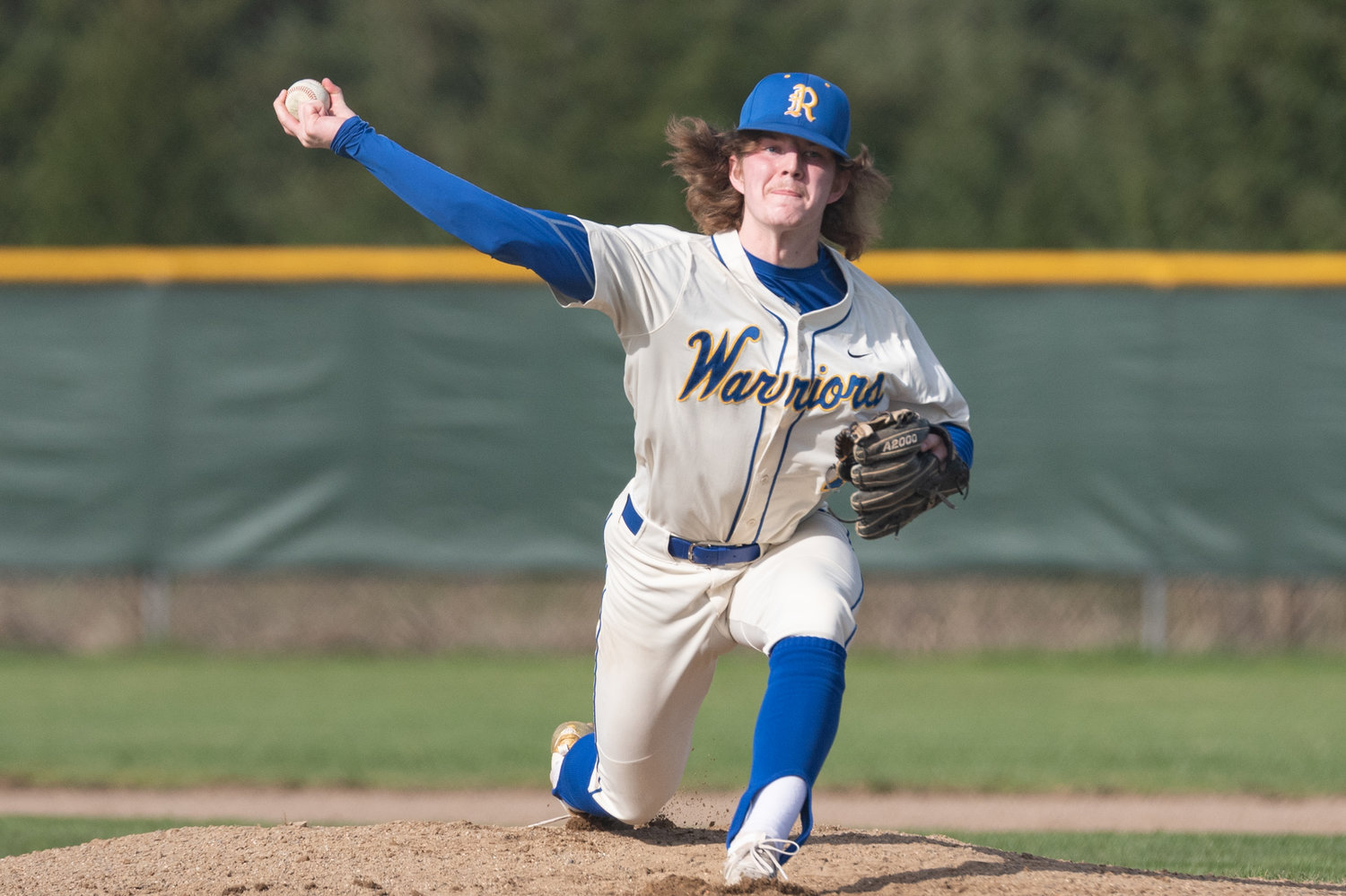 Rochester's Braden Hartley delivers a pitch against Shelton April 7.