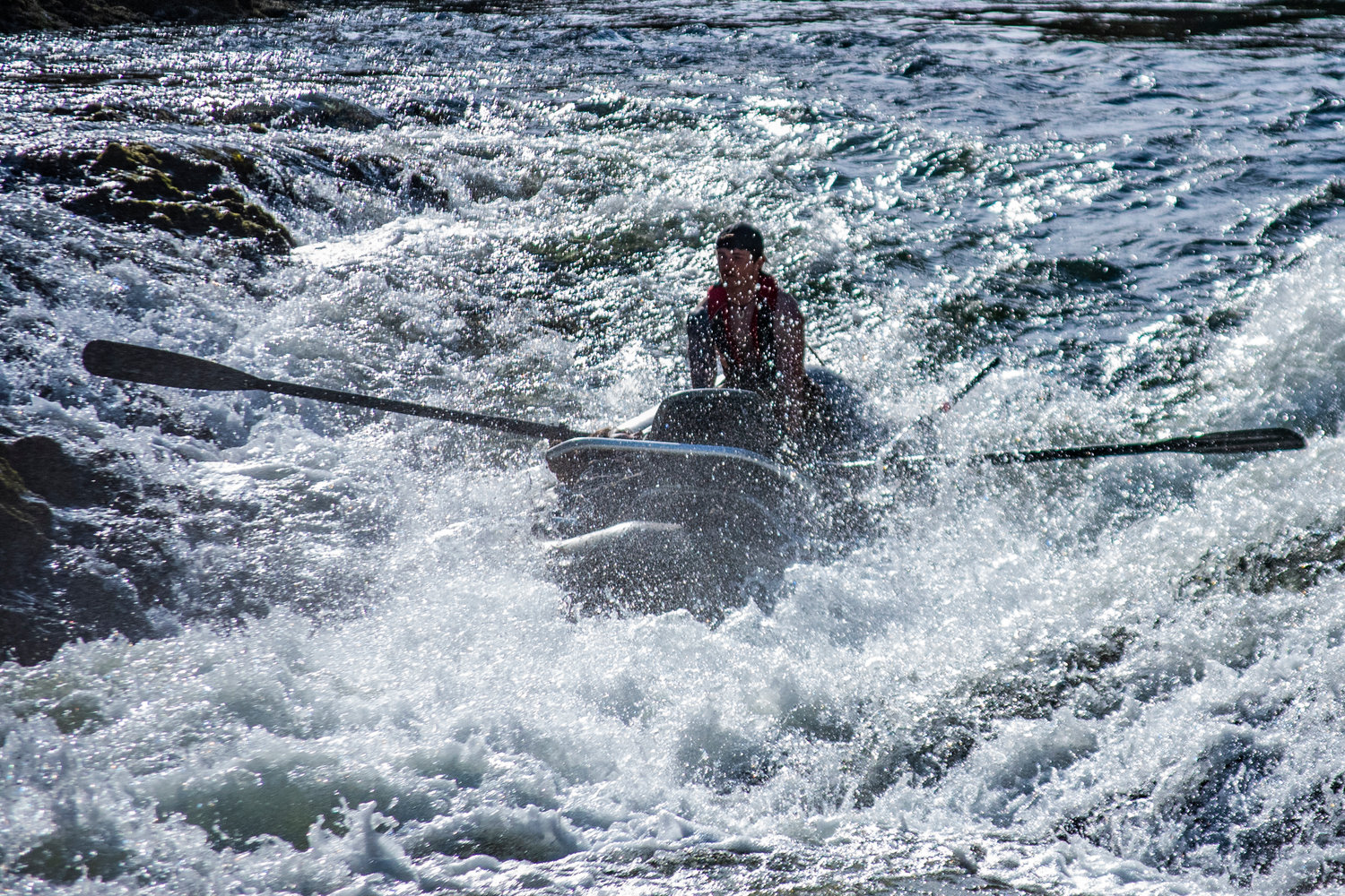 A boater rides through Rainbow Falls during the Pe Ell River Run on Saturday.