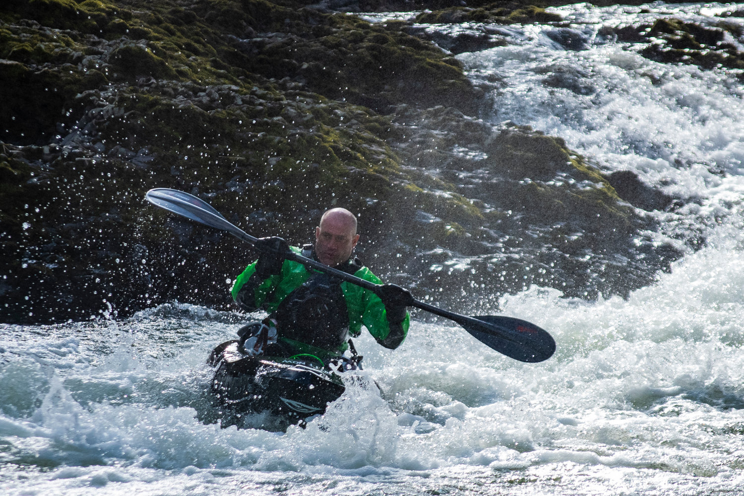 A kayaker fights the current at Rainbow Falls during the Pe Ell River Run on Saturday.