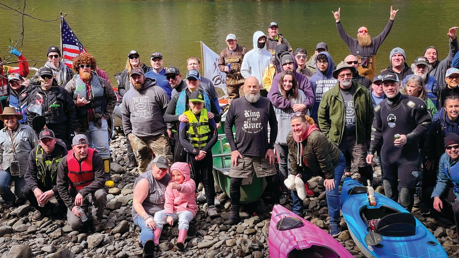 Attendees pose for a photo before launching onto the Chehalis during the Pe Ell River Run Saturday morning.