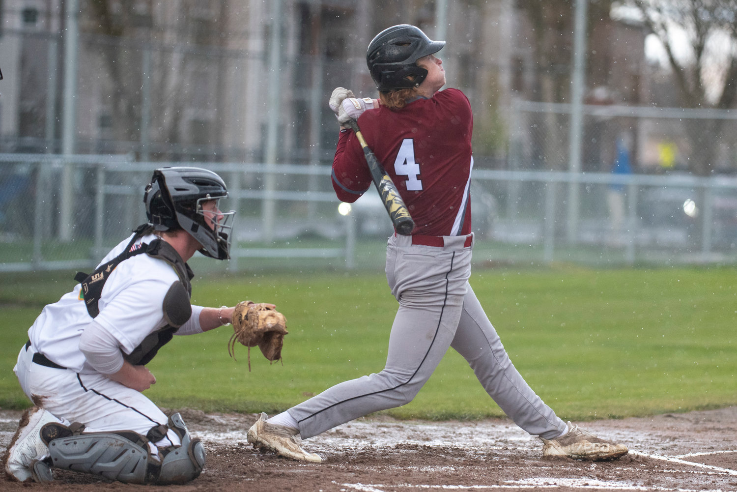W.F. West's Logan Moore fouls off a Tumwater pitch during a road game on April 14.