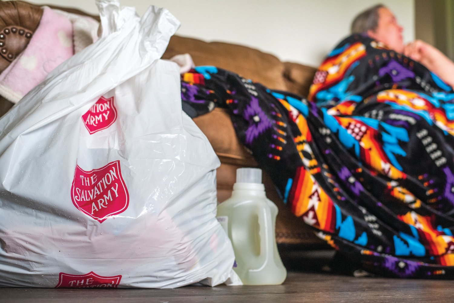 The Salvation Army provides bags for items carried into homes of returning residents at the Chehalis Avenue Apartments after flooding forced evacuations.