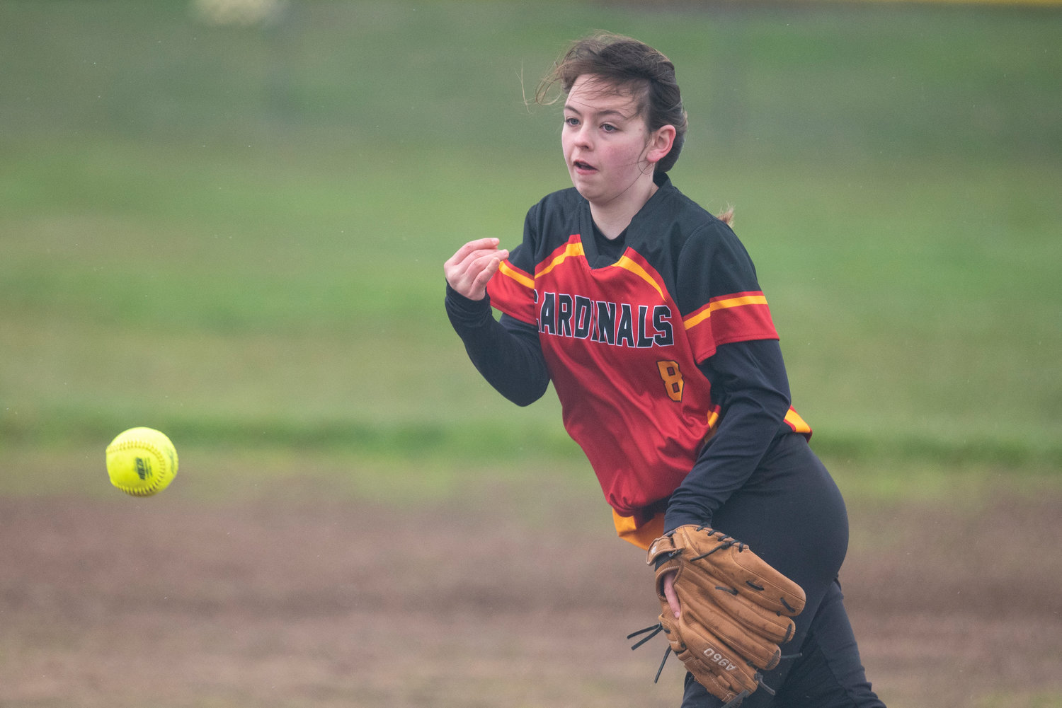 Winlock's Cali Geehan tosses a pitch to an Adna batter during a home game on April 20.