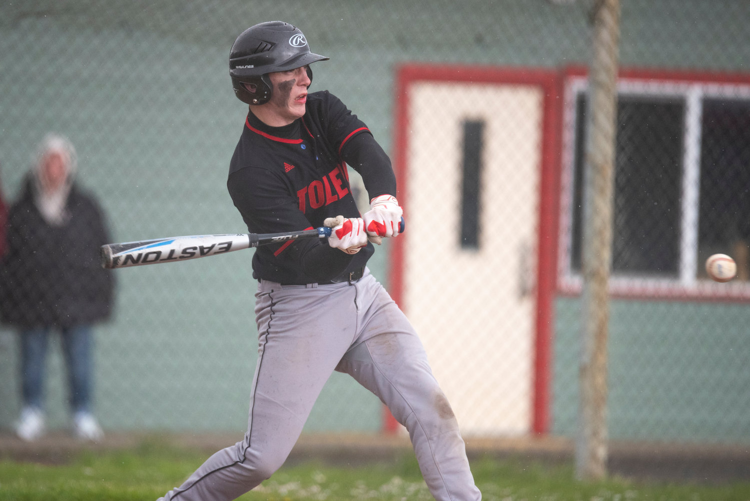 Toledo's Geoffrey Glass loads up to swing at a Winlock pitch during a road game on April 21.