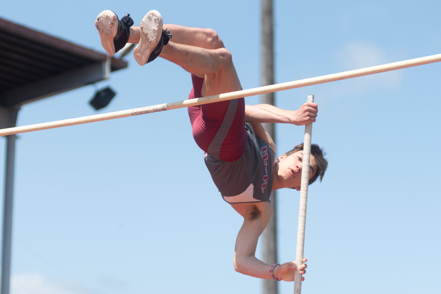 W.F. West's Dakota Collins leaps over the bar in the pole vault April 23 at the Chehalis Activators Classic at W.F. West.