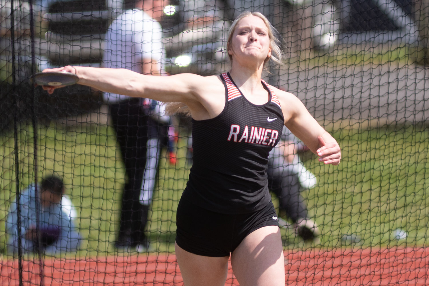 Rainier's Isabella Holmes throws in the discus at the Chehalis Activators Classic at W.F. West April 23.