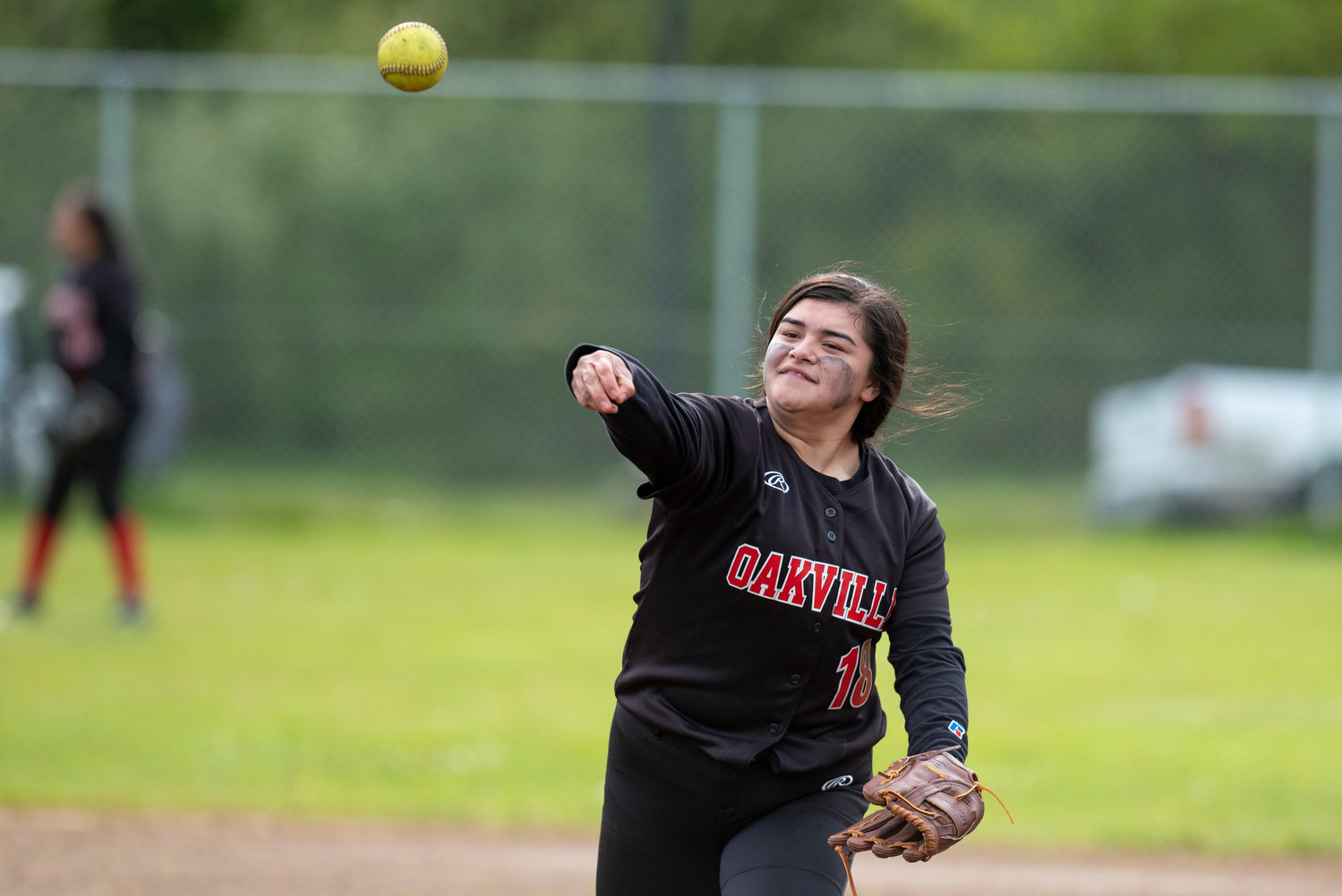 An Oakville infielder throws to first base during a home game against Mossyrock on April 28.