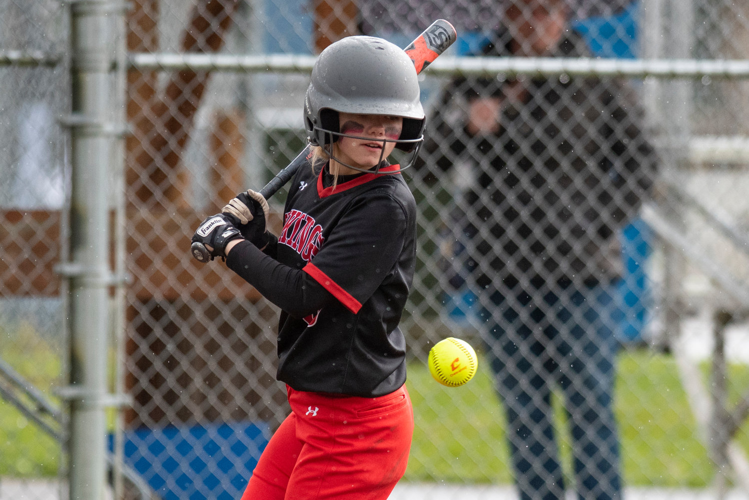 Mossyrock's Addison Barrows gets hit by an Oakville pitch during a road game on April 28.