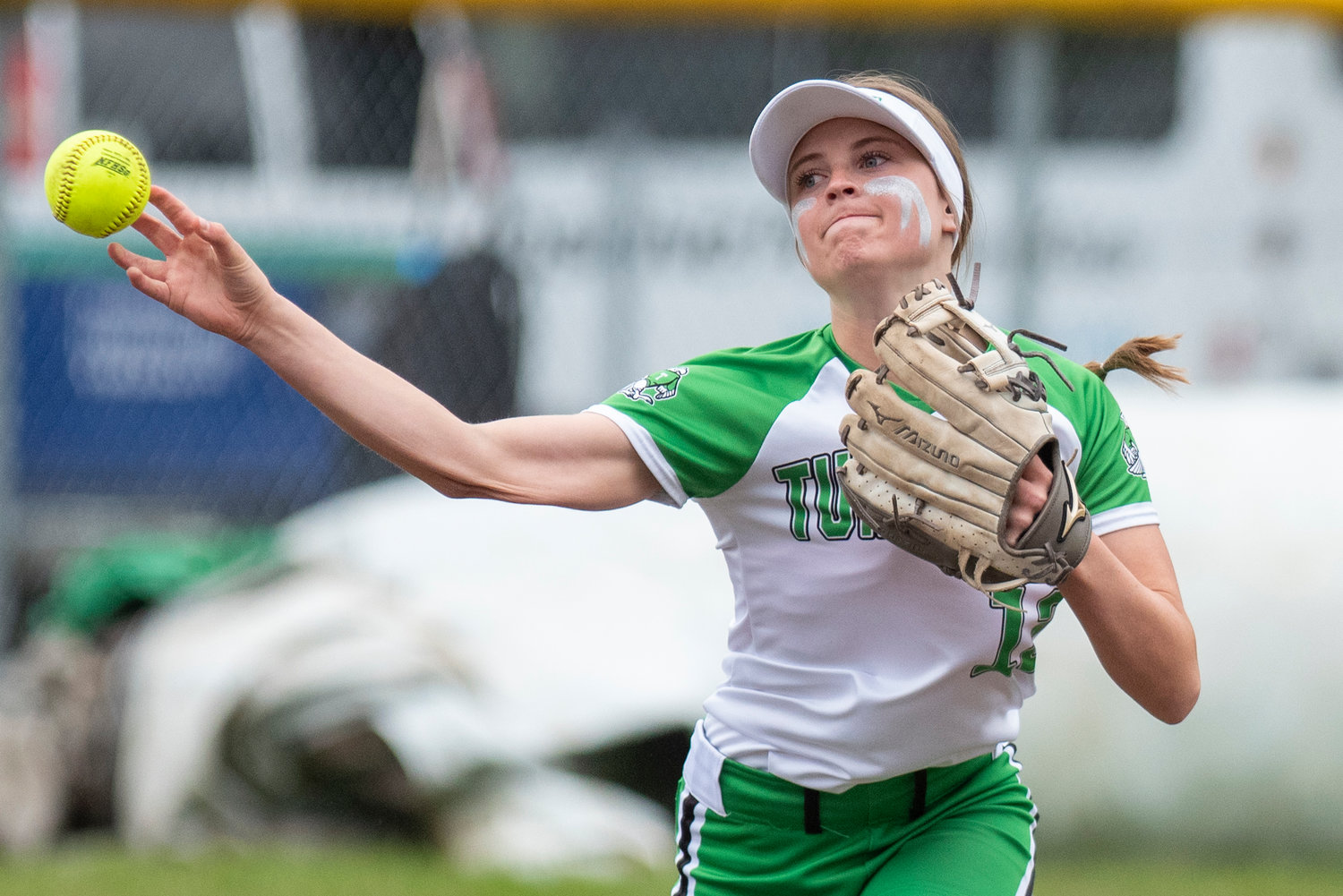 Tumwater shortstop Aly Waltermeyer makes a throw to first base during a home game against W.F. West on May 2.