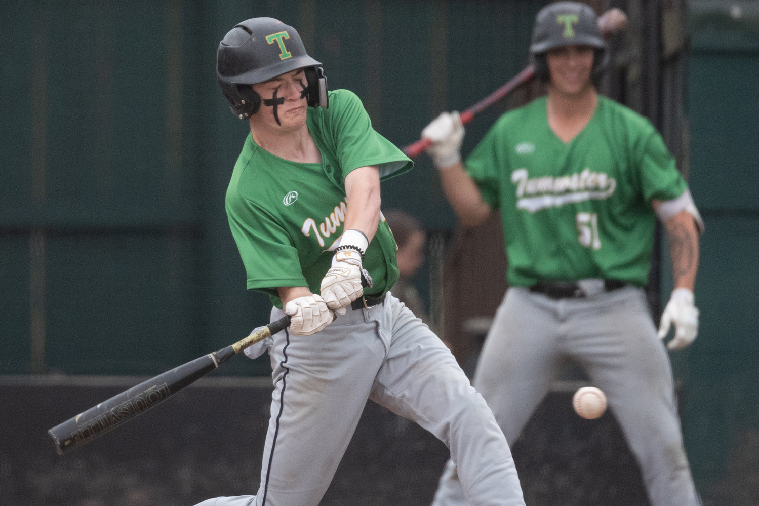 Tumwater's Brayden Oram makes contact with a pitch against Centralia May 2.
