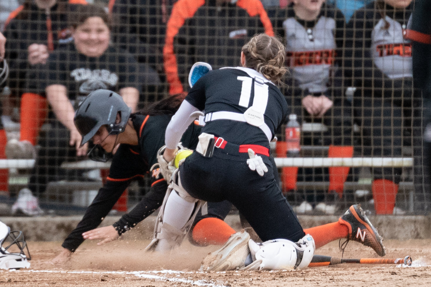 Centralia's Maddie Sievert slides into home plate as the Shelton catcher looks to get her out May 2.