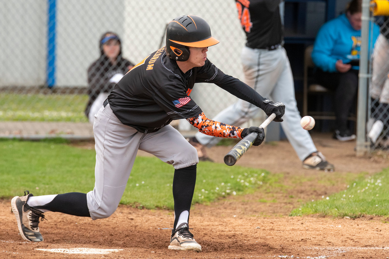 Rainier's Jake Meldrum sqaures up for a bunt during a district playoff play-in game against Wahkiakum on May 3.