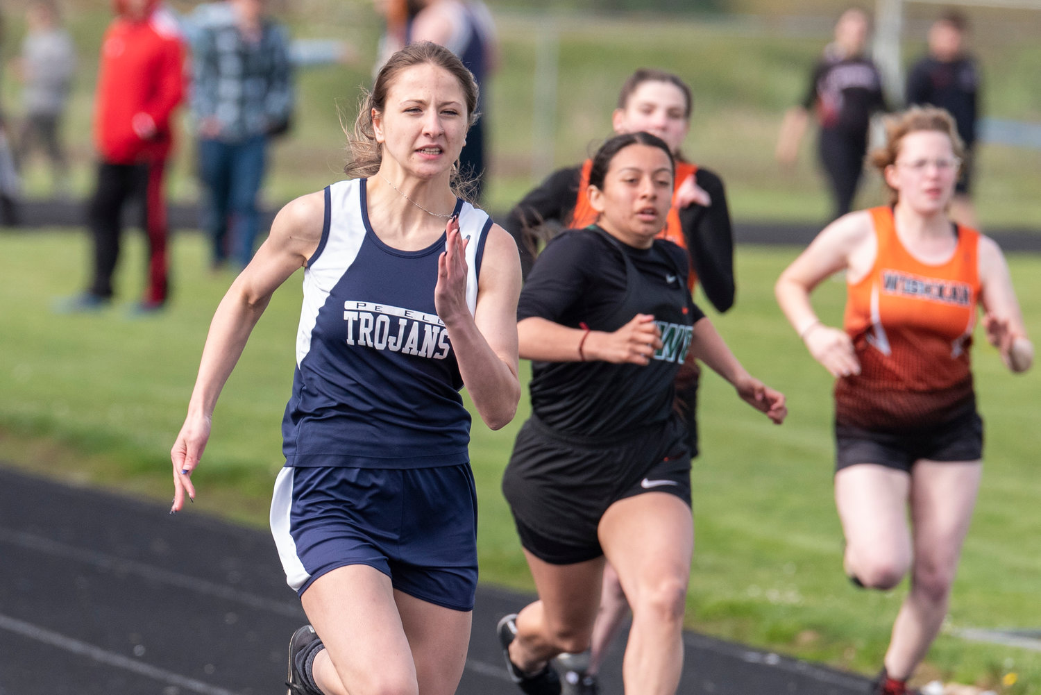 Pe Ell's Charlie Carper wins the girls 100-meter dash during the annual Pirate Classic at Adna High School on Tuesday, May 3.