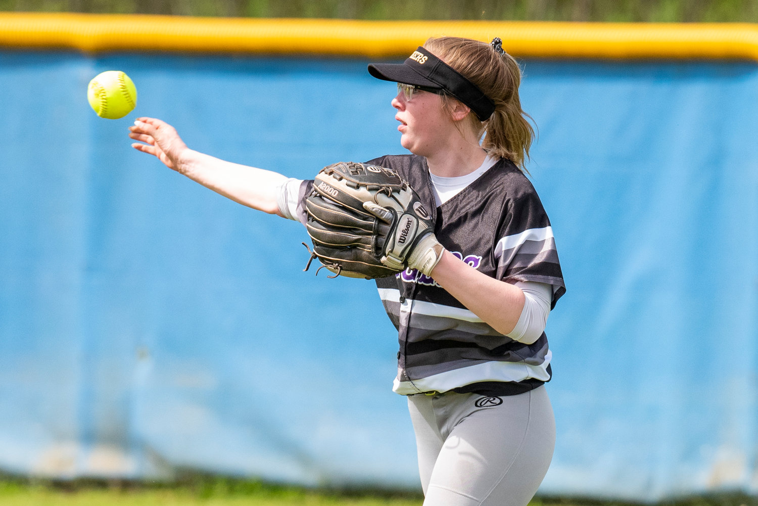 Onalaska's Hannah James makes a throw from center field during a road game at Adna on May 4.