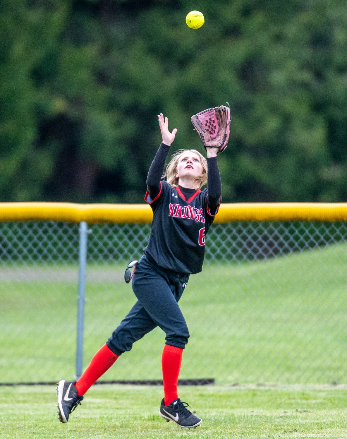 Mossyrock left fielder Addison Barrows catches a fly ball against Naselle on May 9.