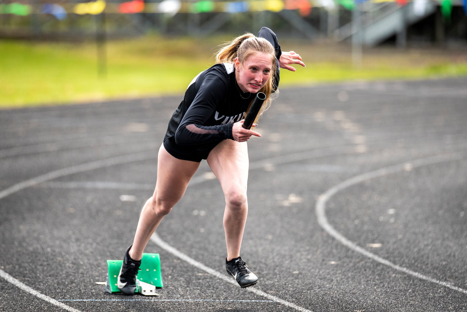 Mossyrock's Teaguen Weise takes off from the starting blocks in the 4x200-relay at the 1B District IV track and field championships on May 11 in Raymond. Weise won four events to help the Vikings place second as a team.
