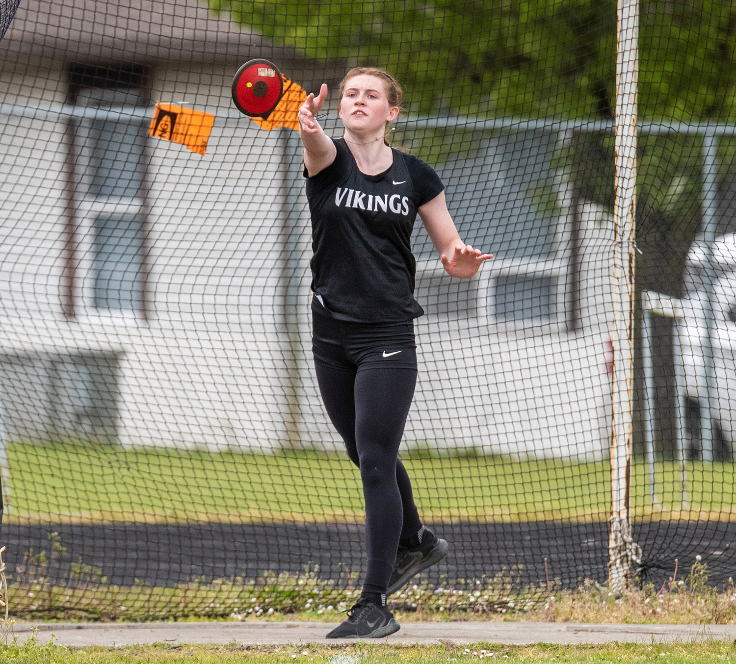 Mossyrock's Paige Houghtelling launches the discus at district on May 11.