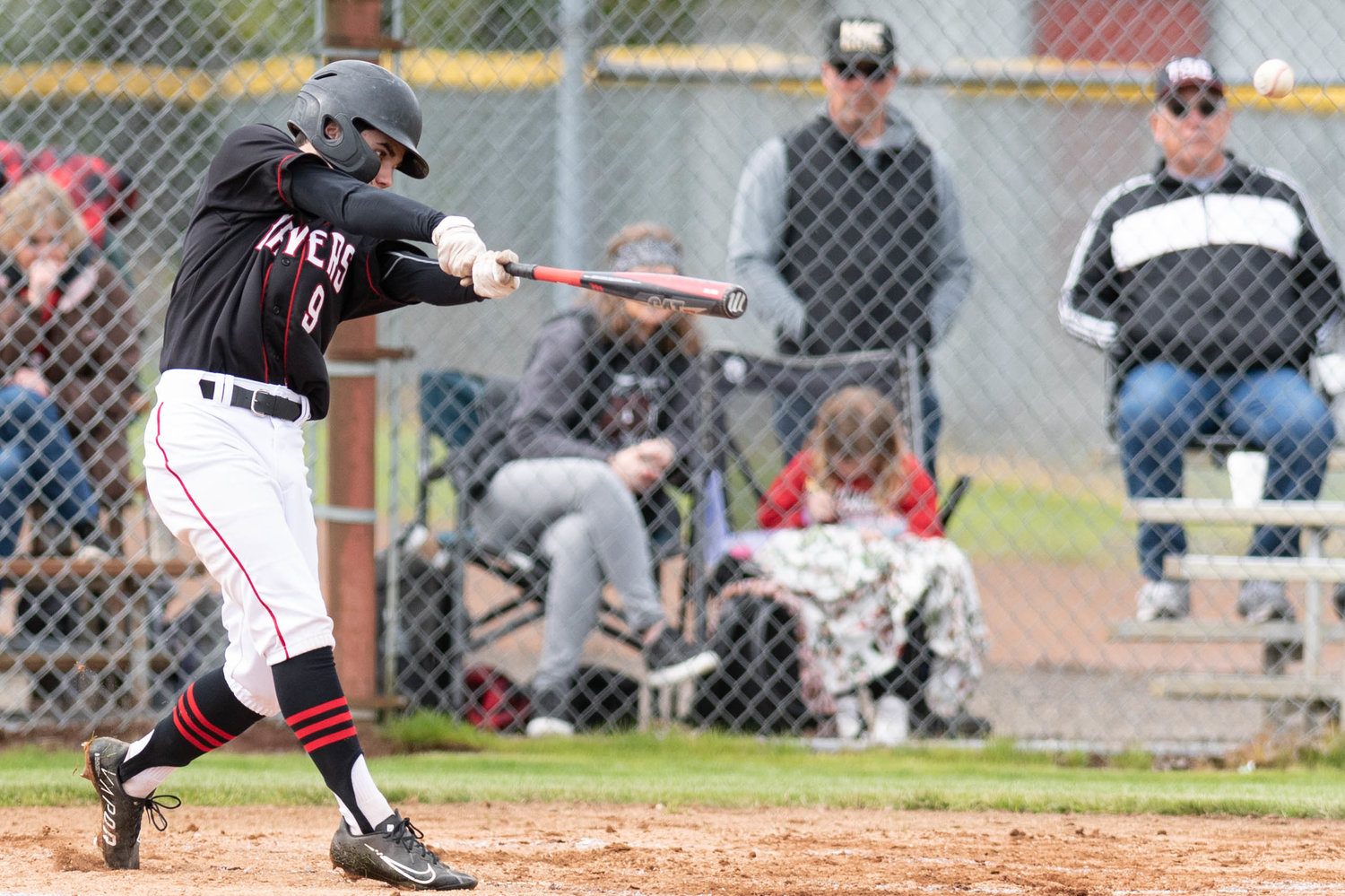 Tenino's Austin Gonia connects on an Eatonville pitch during the district playoffs in Castle Rock on May 13.