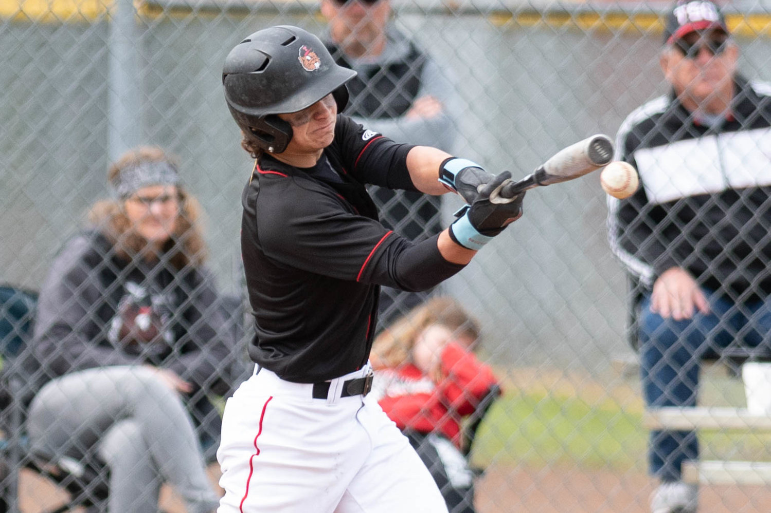 Tenino's Easton Snider makes contact with a pitch against Eatonville in the 1A District 4 playoffs at Castle Rock May 13.
