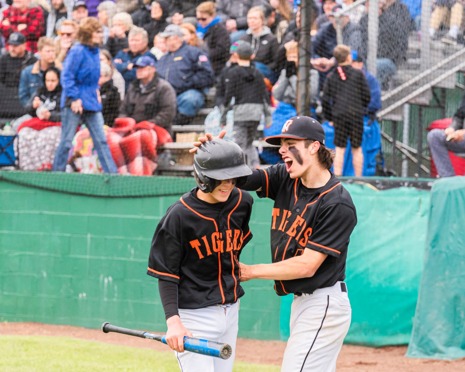 Tigers athletes get pumped up during a hitting rally Friday in Chehalis.