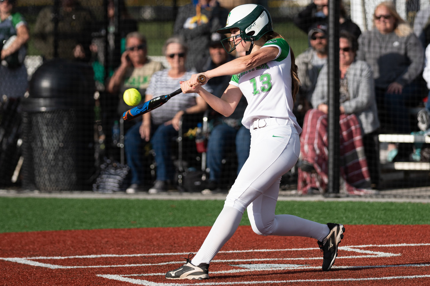 Tumwater's Aly Waltermeyer makes contact with a pitch against W.F. West in the 2A District 4 championship game at Rec Park May 20.
