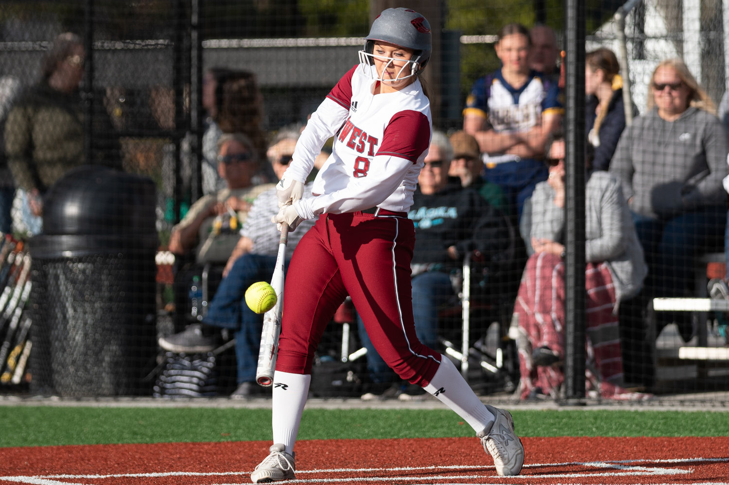 W.F. West's Staysha Fluetsch makes contact with a pitch against Tumwater in the 2A District 4 championship game at Rec Park May 20.