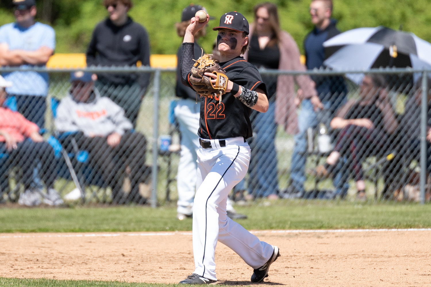Napavine third baseman Conner Holmes throws to first for an out against Colfax in the 2B State Regional Round at Adna High School May 21.