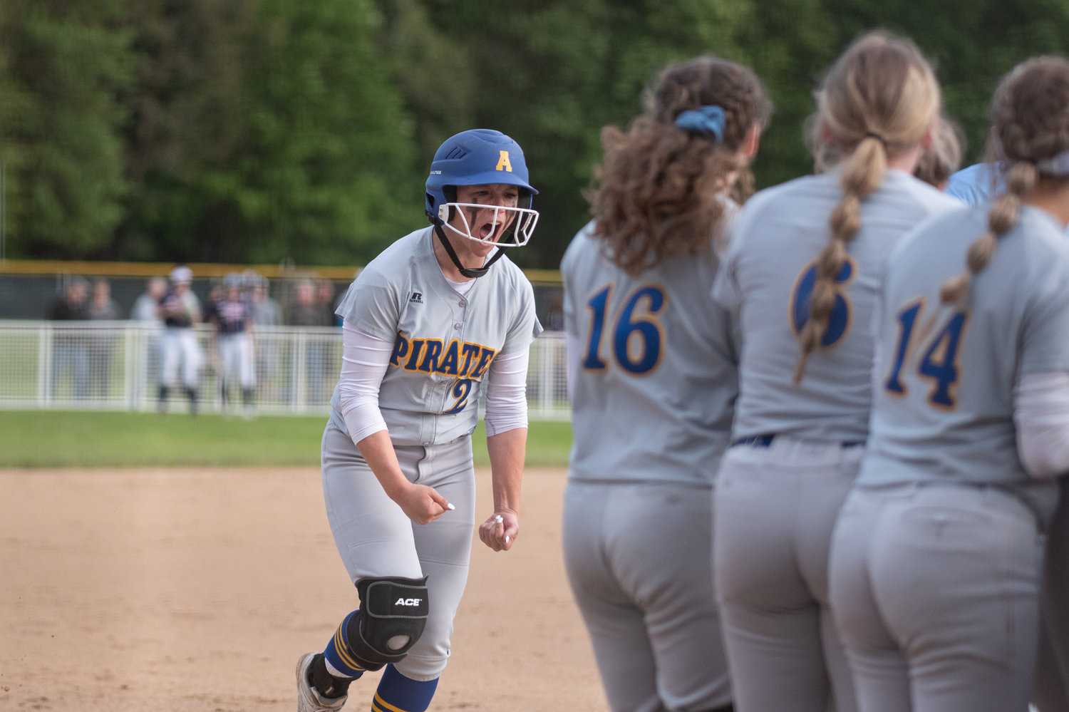 Adna's Ava Simms celebrates after a home run against PWV in the 2B District 4 softball championship game at Fort Borst Park in Centralia May 21.