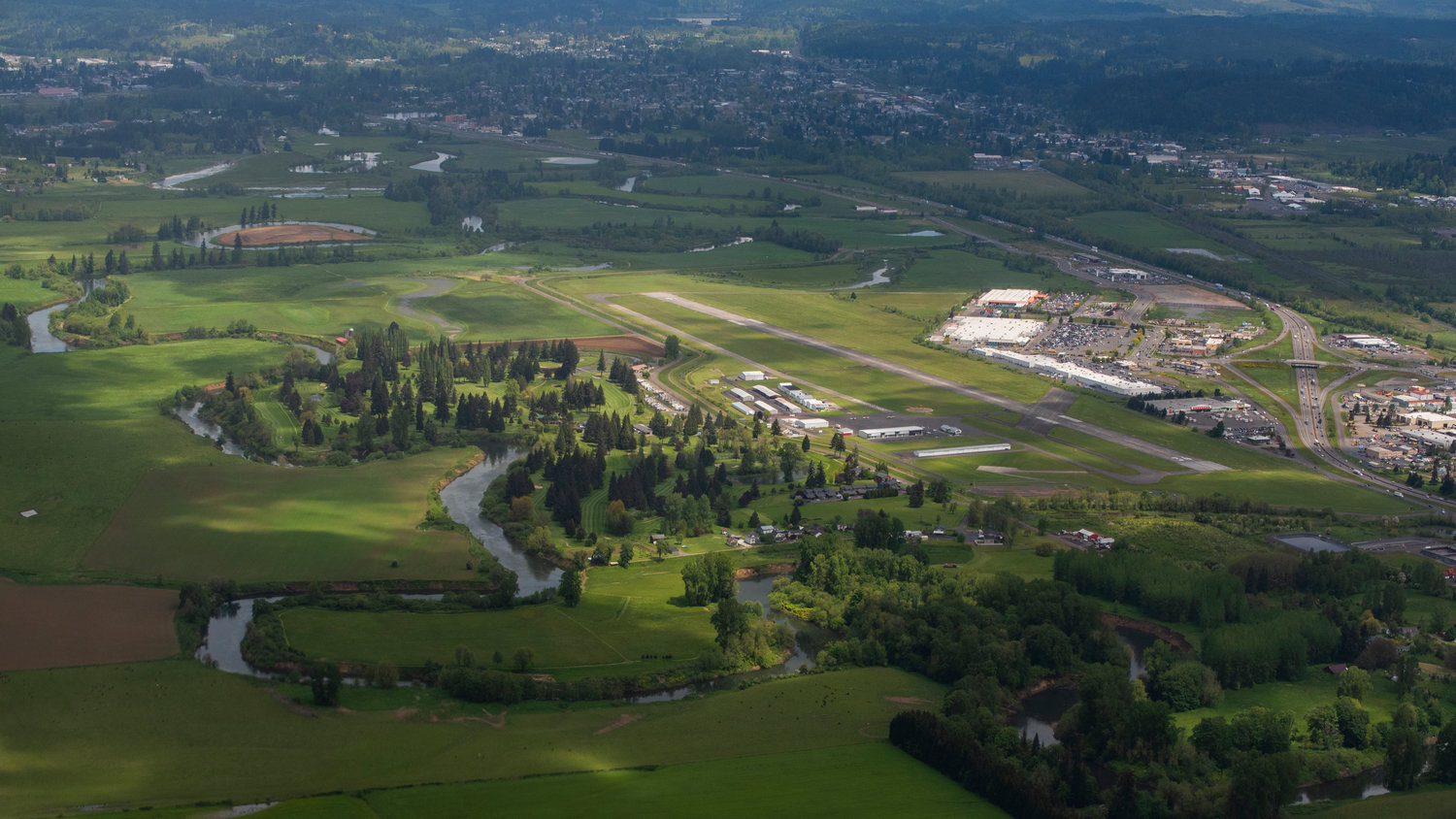 The Chehalis River winds alongside Riverside Golf Course and the Chehalis-Centralia Airport on Friday.