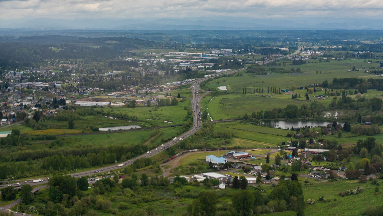 Interstate 5 and the Chehalis River are seen from above in the Twin Cities.