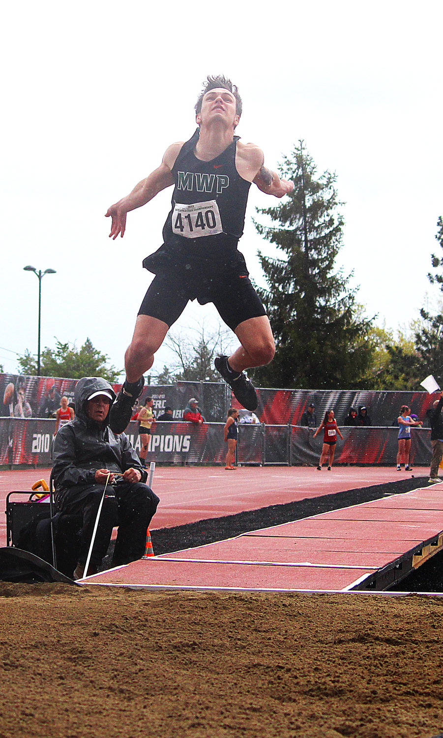 Morton White Pass' Kysen Collette makes an attempt during the boys long jump finals during the State 1B/2B/1A Track and Field Championships in Cheney, Washington on May 27, 2022.