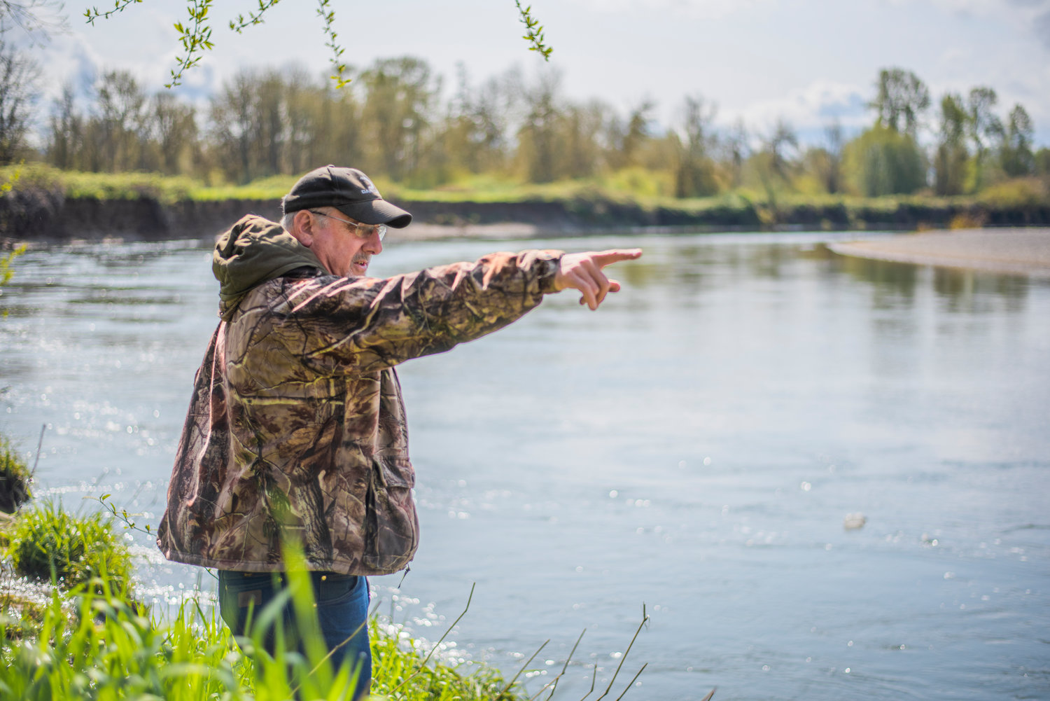 Jay Gordon points out to the Chehalis River from his property in Porter while talking about the history of the land his family has been farming for over 100 years.