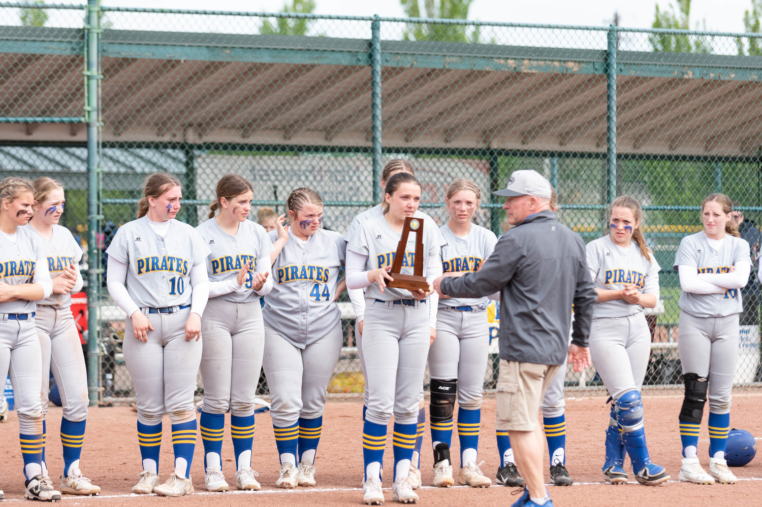 Adna is handed a second place trophy after falling to PWV in the state title game, 11-0, May 28 at Gateway Sports Complex in Yakima.